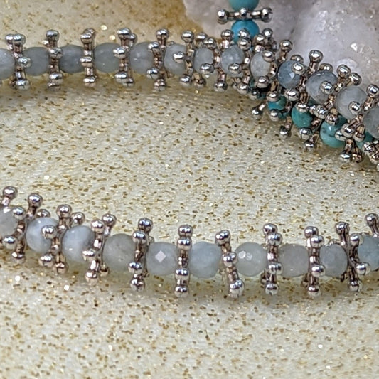 Bracelet:. 4 mm Gemstone Stretch Bracelet with silver tone spacers